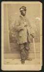 [African American man, full-length portrait, facing right]