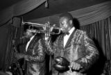 Johnny Lowery (saxophone) and Bennie "Buckwheat" Payne (trumpet) of The Sheiks performing on stage at the Laicos Club in Montgomery, Alabama.