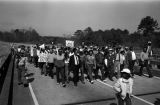 Marchers in rural Dallas or Lowndes County, Alabama during the 20th anniversary reenactment of the Selma to Montgomery March.