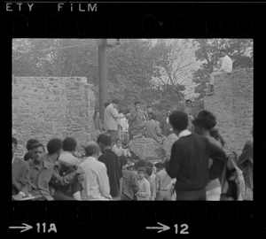 Unidentified man, most likely a Black community leader or activist, addressing the crowd in Franklin Park rally