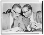 W.J. Durham (right), attorney for the NAACP, talks with Thurgood Marshall, the organization's chief counsel, in federal court here, July 30th