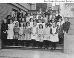 Grades 2A and 3B school children on the steps of the B Street School