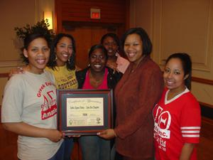 Delta Sigma Theta members with certificate