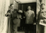 Man in Front of Microphone at the Dedication of the New YMCA Building