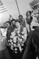 Civil rights leaders laying a wreath at the site of Viola Liuzzo's murder in rural Lowndes County, Alabama, during the 20th anniversary reenactment of the Selma to Montgomery March.