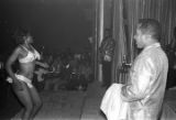 Dancer performing on stage with Bobby Moore and the Rhythm Aces at the Laicos Club in Montgomery, Alabama.