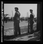 [Untitled photo, possibly related to: Detroit, Michigan. Riot at the Sojourner Truth homes, a new U.S. federal housing project, caused by white neighbors' attempt to prevent Negro tenants from moving in. Home guard soldiers on duty]