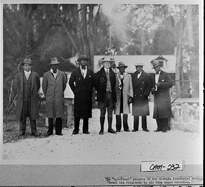 The "Spiritual" singers of the Georgia Industrial College treat the President to old time negro melodies.