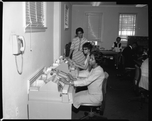 Industrial Bank of Washington Ga. [Georgia] Ave. Branch (Employees at Machines), March 1964 [cellulose acetate photonegative]