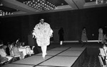 Alpha Phi Alpha fashion show male model walking on the runway, Los Angeles, 1985