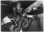 [Production: aircraft. This Negro worker using a portable electric drill on a YP-38 sub-assembly in a large western aircraft plant was trained in a very short time to do fast accurate work]