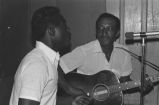 James ""Son"" Thomas: Leland, Miss. Shelby ""Poppa Jazz"" Brown home and family. Singing, dancing, and playing guitar (JTP D-68 #1603)