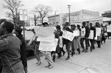 Demonstrators marching toward the Jefferson County Courthouse in downtown Birmingham, Alabama, for a voter registration rally.