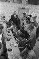 Police officers talking to demonstrators during a sit-in at City Pharmacy in Talladega, Alabama.