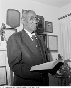 Pastor Arthur Vance Voice holding his Bible #2