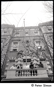 Umoja (Black student union) activists look out from balcony of occupied administration building, Boston University
