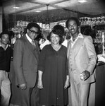 Thumbnail for Donald Bohana, Guy Crowder, and an unidentified woman posing at a nightclub, Los Angeles, ca. 1978