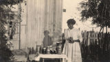 African American woman with jars of preserves in Madison County, Alabama.