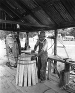 man making a barrel