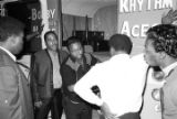 Men loading a trailer after a performance of Bobby Moore and the Rhythm Aces at a dance at the National Guard Armory on Dallas Avenue in Selma, Alabama.