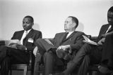 Congressman Carl Elliott seated with two other men during a meeting of educators at Alabama State College in Montgomery, Alabama.