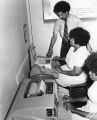 Students receive instructions in teletype communications