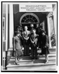 [Walter White, left, and Ike Smalls, surrounded by Third Officers (clockwise from left) Mildred E. Carter, Elizabeth C. Hampton, Harriette B. White, Glendora Moore, Evelyn F. Greene, Dovey M. Johnson, and Doris M. Norrel, at the WAAC Training Center, Fort Des Moines]