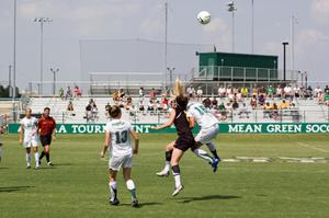 NT players and opponents after headbutting ball