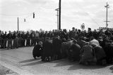 Civil rights demonstrators kneeling in prayer on U.S. Highway 80 in Selma, Alabama, on Turnaround Tuesday.