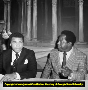 Muhammad Ali and Hank Aaron at a press conference, Atlanta, Georgia, August 1970.