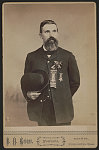 [Unidentified Civil War veteran wearing Grand Army of the Republic medal and memorial ribbon]