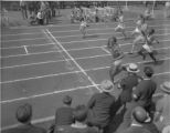 Ralph Metcalfe wins NCAA 100-yard dash in outside lane, 1932