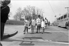 Sanitation workers strike supporters marching on Martin Luther King Jr. Drive in downtown Atlanta, Georgia, March 28, 1970. Photograph is part of a series labeled "Strike march."