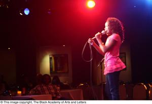 Kirondria Woods singing on stage