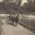 Thumbnail for Woman and young girl in a carriage on the Cahaba River ferry in Cahaba, Alabama.