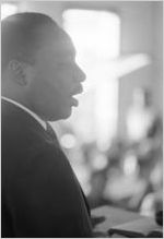 Martin Luther King, Jr., speaking to an audience in a church building, probably First Baptist Church in Eutaw, Alabama.