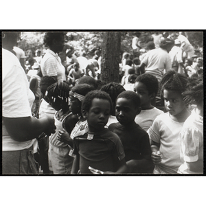 A Group of children standing during an activity at a camp