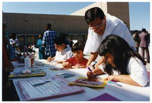 Children with Craft Projects During Health Fair