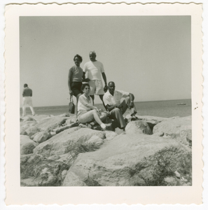 Digital image of Taylor family members posing on rocks on Martha's Vineyard