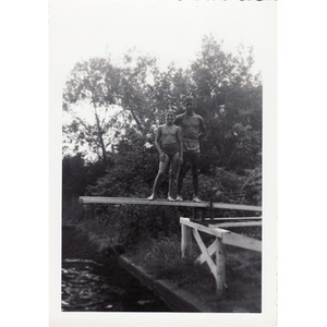 Two boys pose on diving board at Breezy Meadows Camp