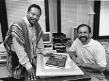 Dr. Molefi Asante and Mark Mattson pose with their book