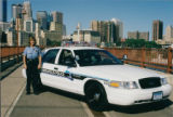 Police Officer With Cruiser