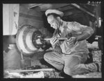 Fort Knox. Negro mechanics. Wheel job on an army truck at Fort Knox, Kentucky. This Negro soldier, who serves as truck driver and mechanic, plays an important part in keeping the army's transport fleets in service