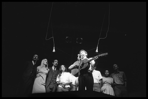 Bob Dylan leading performers on stage, Newport Folk Festival Left to right: Peter Yarrow, Mary Travers, Paul Stookey, Joan Baez, Bob Dylan, Bernice Reagon, Cordell Reagon, Charles Neblett, Rutha Harris, Pete Seeger