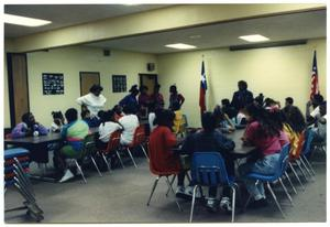 Group of Students of Martin Luther King Middle School at Tables