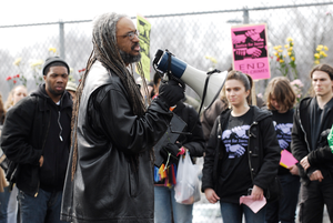 Justice for Jason rally at UMass Amherst: UMass professor Amilcar Shabazz addressing protesters in support of Jason Vassell