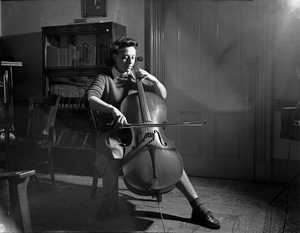 Woman and cello, Howard University : black-and-white photonegative.