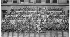 Large group of children posed in front of a building] [acetate film photonegative, banquet camera format.