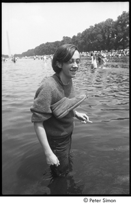 Raymond Mungo wading in a Mall reflecting pool during the Poor People's Campaign Solidarity Day