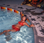 Gwen Gordy Fuqua in the pool at Berry Gordy's party, Los Angeles